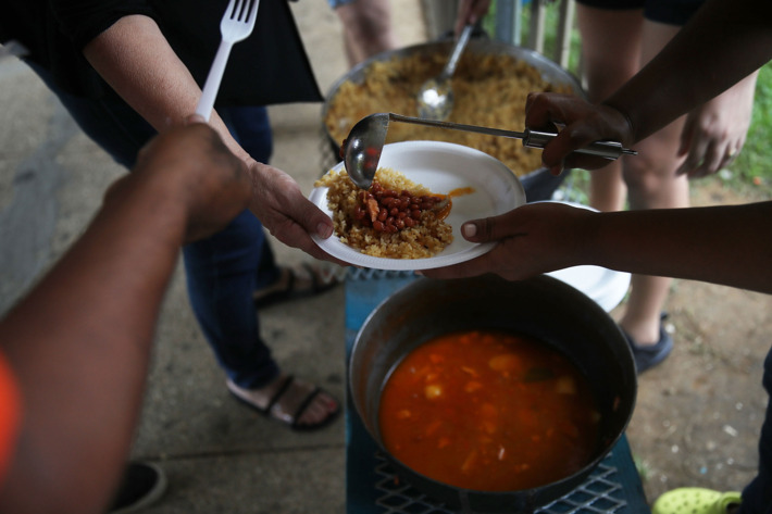 volunteer communal pot of food